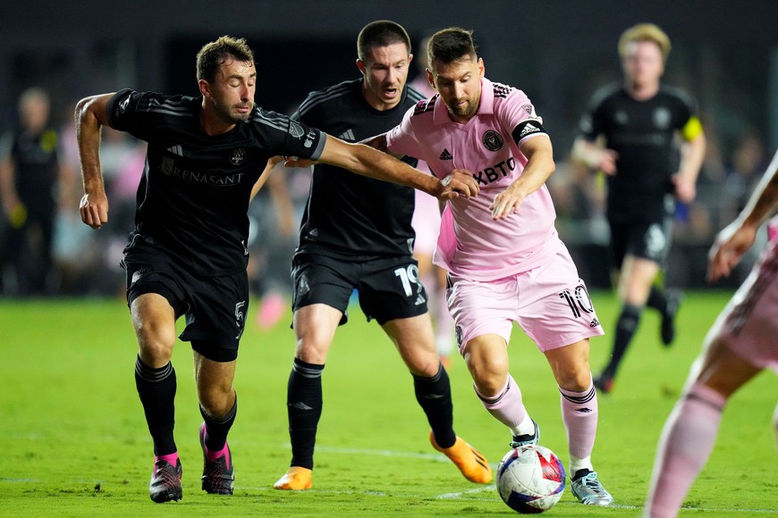 Aug 30, 2023; Fort Lauderdale, Florida, USA; Inter Miami forward Lionel Messi (10) kick the ball past Nashville SC defender Jack Maher (5) during the first half at DRV PNK Stadium. Mandatory Credit: Rich Storry-USA TODAY Sports