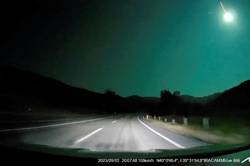 A meteor lights up the night sky in Turkey's Gumushane Province, September 2, 2023, in this still image obtained from social media dashcam video. X (Twitter)/@HABIP785 via REUTERS  THIS IMAGE HAS BEEN SUPPLIED BY A THIRD PARTY. MANDATORY CREDIT. NO RESALES. NO ARCHIVES.