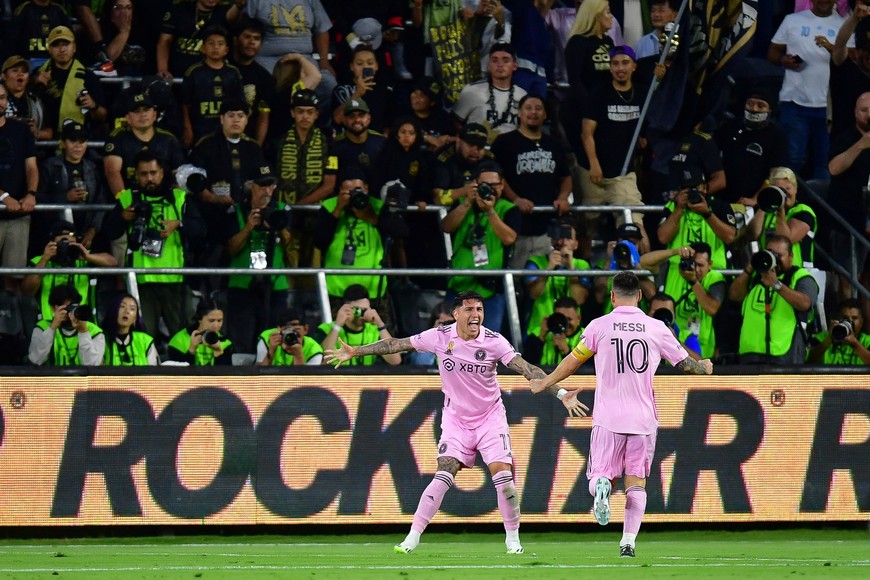 Sep 3, 2023; Los Angeles, California, USA; Inter Miami midfielder Facundo Farias (11) celebrates his goal scored against the Los Angeles FC with forward Lionel Messi (10) at BMO Stadium. Mandatory Credit: Gary A. Vasquez-USA TODAY Sports