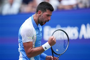 Sep 5, 2023; Flushing, NY, USA; Novak Djokovic of Serbia wins a point before match point against Taylor Fritz of the United States on day nine of the 2023 U.S. Open tennis tournament at USTA Billie Jean King National Tennis Center. Mandatory Credit: Danielle Parhizkaran-USA TODAY Sports