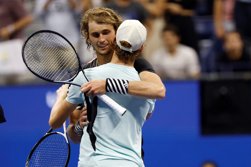 Sep 4, 2023; Flushing, NY, USA; Alexander Zverev of Germany (L) hugs Jannik Sinner of Italy (R) after their match on day eight of the 2023 U.S. Open tennis tournament at USTA Billie Jean King National Tennis Center. Mandatory Credit: Geoff Burke-USA TODAY Sports