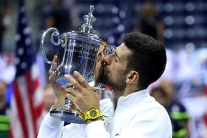 Novak Djokovic en los festejos de su cuarto campeonato.