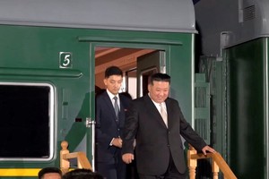 A view shows North Korean leader Kim Jong Un disembarking from his train and being greeted by Russian officials in Khasan in the Primorsky region, Russia, in this still image from video published September 12, 2023. Courtesy Governor of Russia's Primorsky Krai Oleg Kozhemyako Telegram Channel via REUTERS ATTENTION EDITORS - THIS IMAGE WAS PROVIDED BY A THIRD PARTY. NO RESALES. NO ARCHIVES. MANDATORY CREDIT.