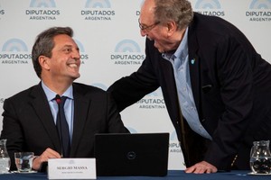 Sergio Massa y el presidente de la comisión de Hacienda de Diputados, Carlos Heller. Crédito: Archivo El Litoral.