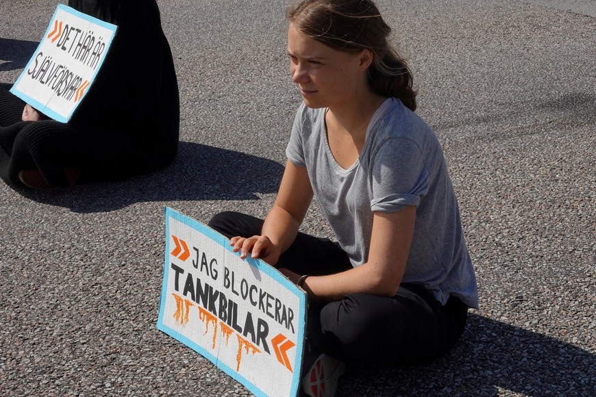 FILE PHOTO: FILE PHOTO: Climate activist Greta Thunberg and other activists block the entrance to the Oljehamnen, in Malmo, Sweden, July 24, 2023.REUTERS/Tom Little/File Photo