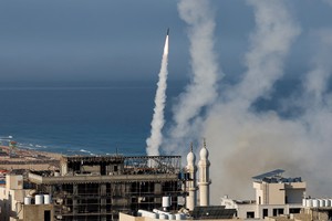 Rockets are fired by Palestinian militants into Israel, in Gaza City October 7, 2023. REUTERS/Mohammed Salem