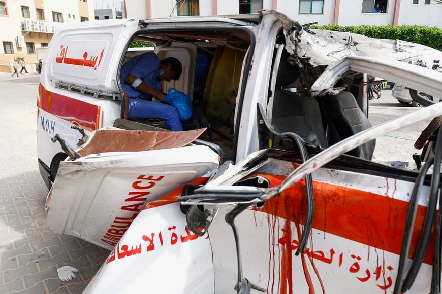 A view of an ambulance hit by an Israeli strike, after Hamas gunmen launched a surprise attack against Israel, in the southern Gaza Strip, October 7, 2023. REUTERS/Ibraheem Abu Mustafa