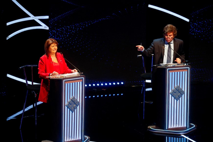 Argentine presidential candidates Patricia Bullrich and Javier Milei attend the presidential debate ahead of the October 22 general elections, at the University of Buenos Aires' Law School, Argentina October 8, 2023. REUTERS/Agustin Marcarian/Pool