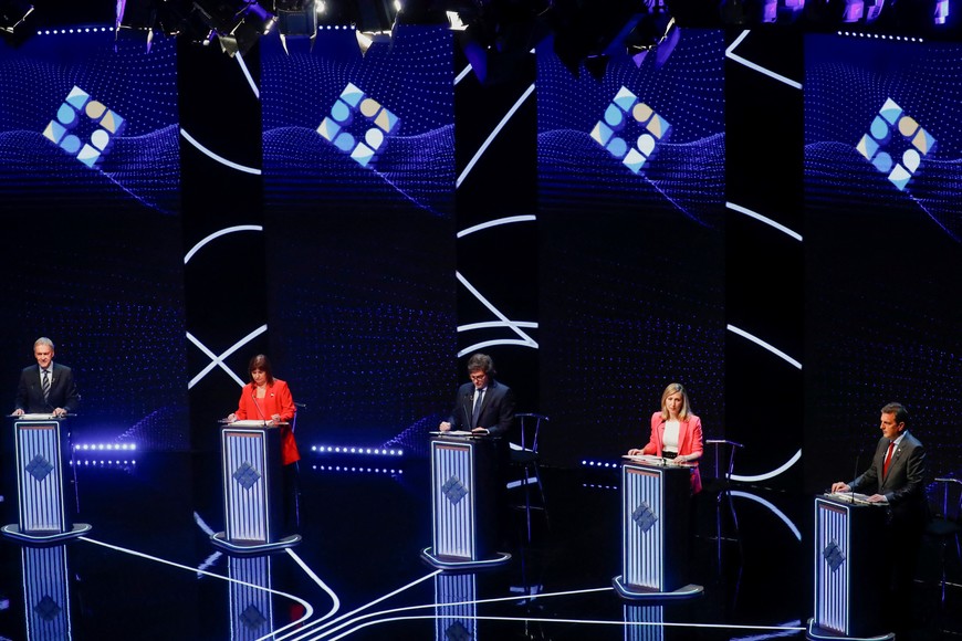 Argentine presidential candidates Myriam Bregman, Sergio Massa, Patricia Bullrich, Juan Schiaretti, and Javier Milei attend the presidential debate ahead of the October 22 general elections, at the University of Buenos Aires' Law School, Argentina October 8, 2023. REUTERS/Agustin Marcarian/Pool