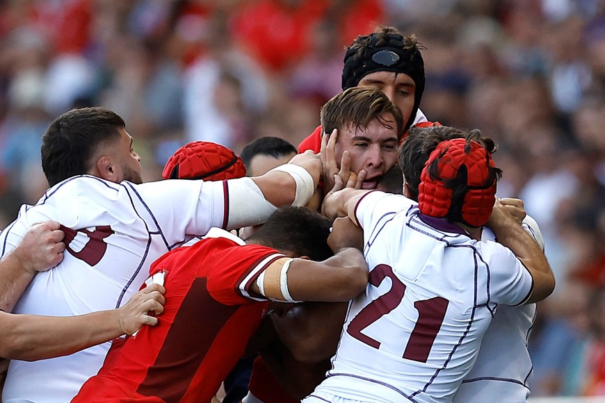 Rugby Union - Rugby World Cup 2023 - Pool C - Wales v Georgia - Stade de la Beaujoire, Nantes, France - October 7, 2023
Georgia's Davit Niniashvili clashes with Wales' Taine Basham REUTERS/Stephane Mahe