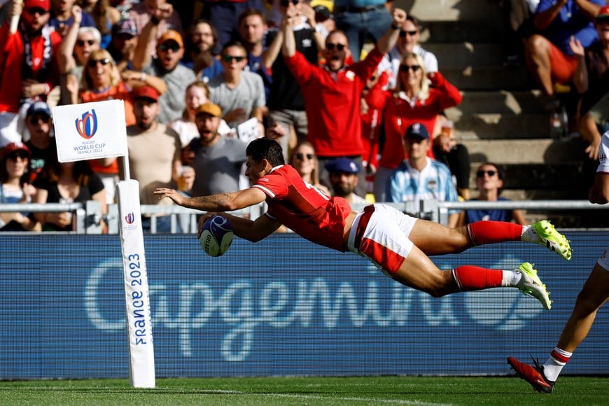 Rugby Union - Rugby World Cup 2023 - Pool C - Wales v Georgia - Stade de la Beaujoire, Nantes, France - October 7, 2023
Wales' Louis Rees-Zammit scores a try REUTERS/Stephane Mahe