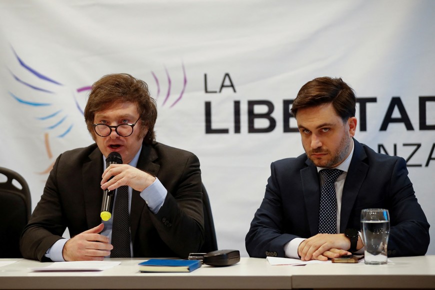 Argentine Presidential candidate Javier Milei of La Libertad Avanza party holds a press conference accompanied by Ramiro Marra, candidate for mayor of the city of Buenos Aires, in response to the denounce made by Argentine President Alberto Fernandez, for "public intimidation",  in Buenos Aires, Argentina, October 11, 2023. REUTERS/Agustin Marcarian