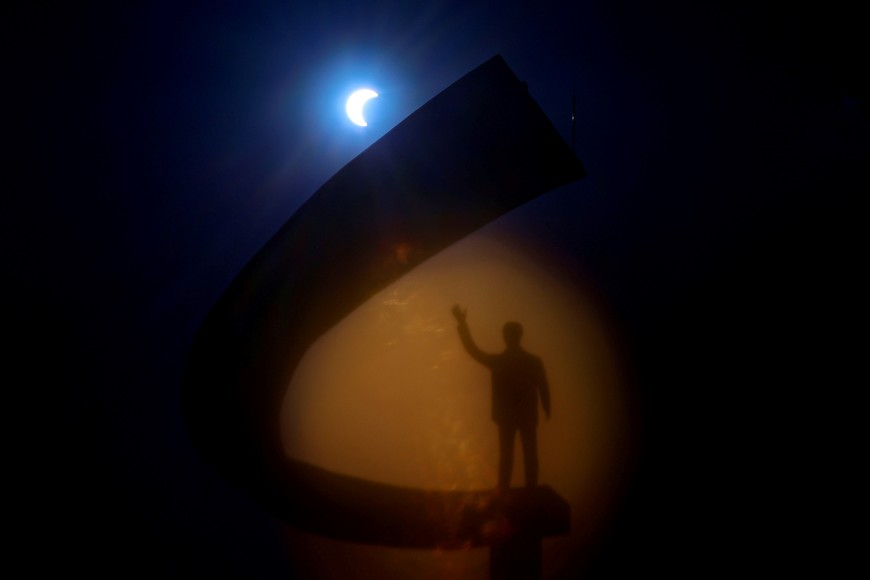 The Moon crosses in front of the Sun over Memorial Juscelino Kubitschek, during an Annular Eclipse in Brasilia, Brazil October 14, 2023. REUTERS/Ueslei Marcelino