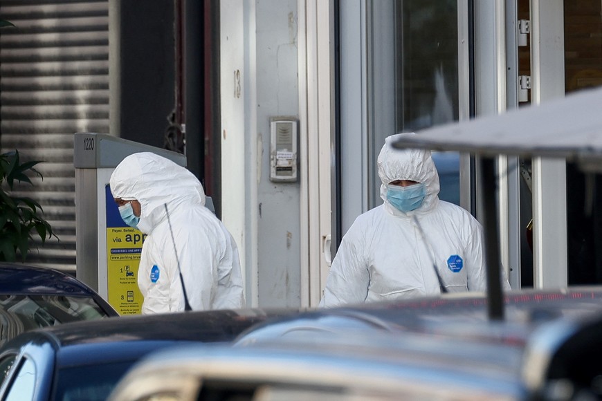 Forensic officers work after a police operation against a deadly shooting suspect, in Schaerbeek, Brussels, Belgium, October 17, 2023. REUTERS/Yves Herman