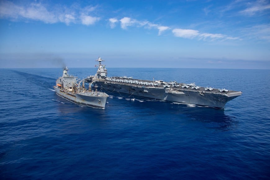 The worldÕs largest aircraft carrier USS Gerald R. Ford steams alongside USNS Laramie (T-AO-203) during a fueling-at-sea in the eastern Mediterranean Sea, as a scheduled deployment in the U.S Naval Forces Europe area of operations, deployed by U.S. Sixth Fleet to defend U.S, allied, and partners interests, in this photo taken on October, 11, 2023 and released by U.S. Navy on October 14, 2023. U.S Naval Forces Central Command / U.S. 6th Fleet / Handout via REUTERS ATTENTION EDITORS - THIS PICTURE WAS PROVIDED BY A THIRD PARTY