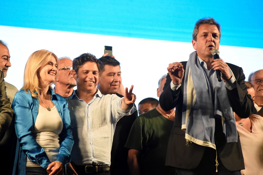 Argentina's presidential candidate Sergio Massa addresses supporters as he reacts with the elected Governor of Buenos Aires Axel Kicillof to the results of the presidential election, in Buenos Aires, Argentina October 22, 2023. REUTERS/Martin Cossarini