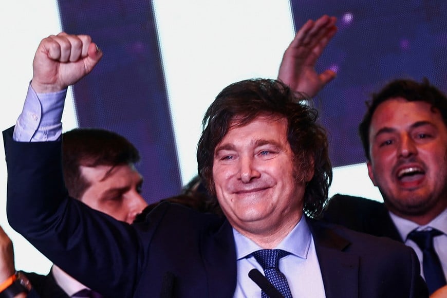Argentina's presidential candidate Javier Milei gestures to supporters as he reacts to the results of the presidential election, in Buenos Aires, Argentina October 22, 2023. REUTERS/Matias Baglietto?