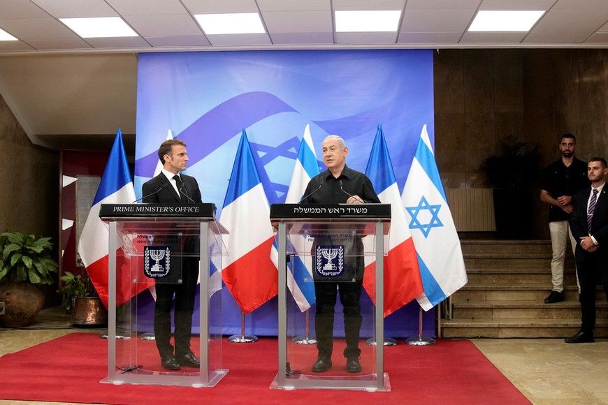 Israeli Prime Minister Benjamin Netanyahu and French President Emmanuel Macron hold a joint press conference, amid the Israeli-Hamas conflict, in Jerusalem, October 24, 2023.  Christophe Ena/Pool via REUTERS