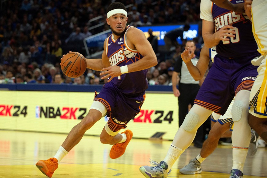Oct 24, 2023; San Francisco, California, USA; Phoenix Suns guard Devin Booker (1) drives to the basket against the Golden State Warriors during the second quarter at Chase Center. Mandatory Credit: D. Ross Cameron-USA TODAY Sports