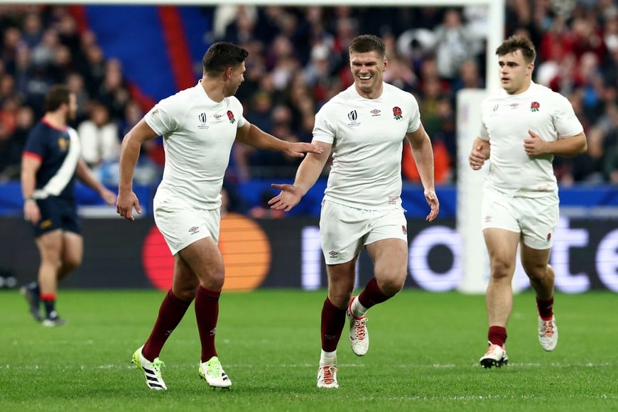 Rugby Union - Rugby World Cup 2023 - Third Place Play-Off - Argentina v England - Stade de France, Saint-Denis, France - October 27, 2023 England's Owen Farrell celebrates scoring a penalty goal with Ben Youngs REUTERS/Stephanie Lecocq