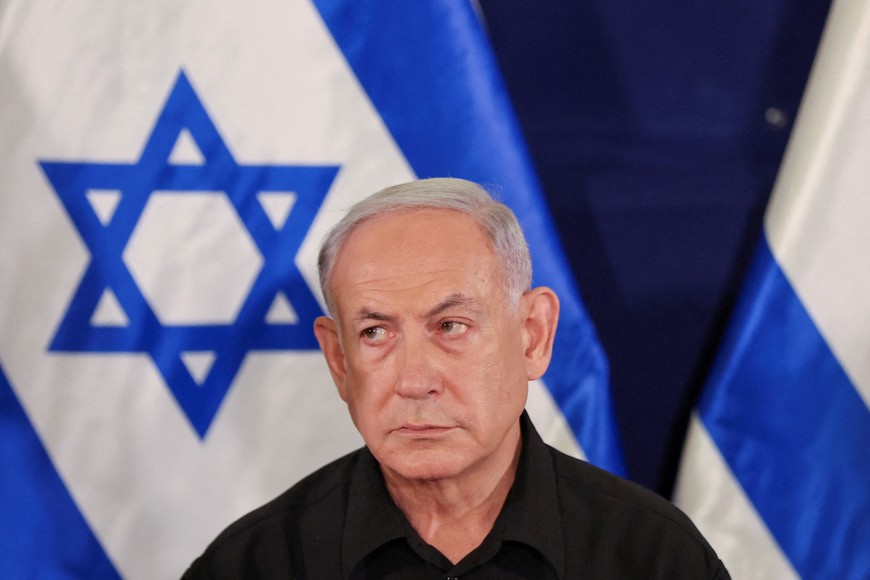 Israeli prime minister Benjamin Netanyahu during a press conference with defense minister Yoav Gallant and Cabinet minister Benny Gantz  in the Kirya military base in Tel Aviv , Israel , 28 October  2023.    ABIR SULTAN POOL/Pool via REUTERS