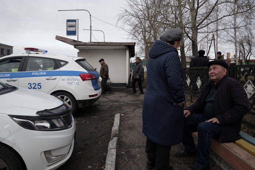 People gather at the entrance to the Kostenko coal mine operated by ArcelorMittal Temirtau as rescue operation continues following a mine fire, in Karaganda, Kazakhstan October 28, 2023. REUTERS/Stringer