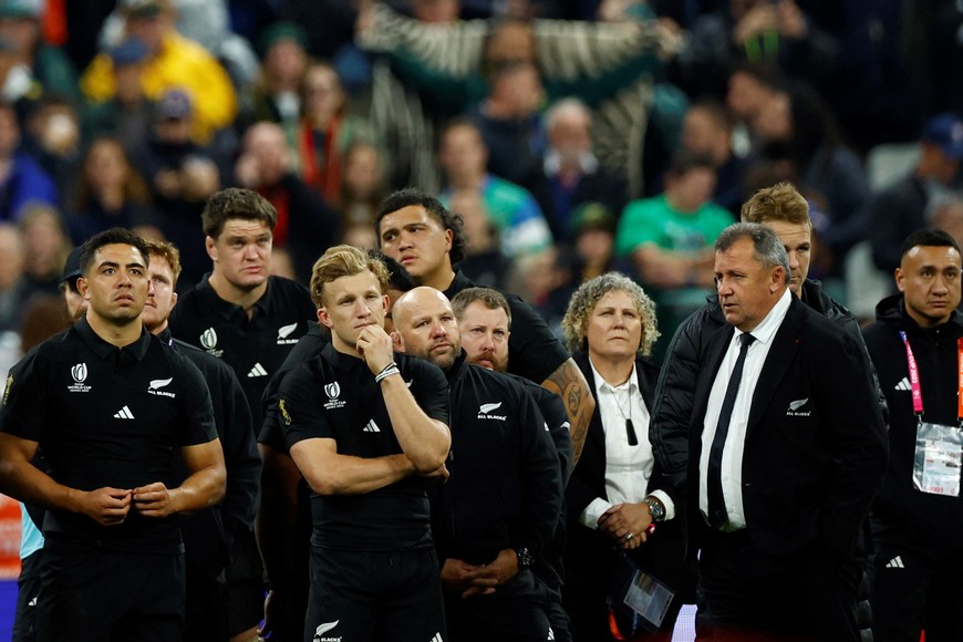 Rugby Union - Rugby World Cup 2023 - Final - New Zealand v South Africa - Stade de France, Saint-Denis, France - October 28, 2023 
New Zealand's Damian McKenzie, Anton Lienert-Brown and head coach Ian Foster look on ahead of the medal ceremony after losing the world cup final REUTERS/Sarah Meyssonnier