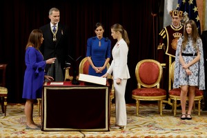 Spain's Princess Leonor swears an oath to the constitution as her parents Spain's King Felipe, Queen Letizia and sister Princess Sofia look at her at the parliament in Madrid, Spain, October 31, 2023. Ballesteros/Pool via REUTERS