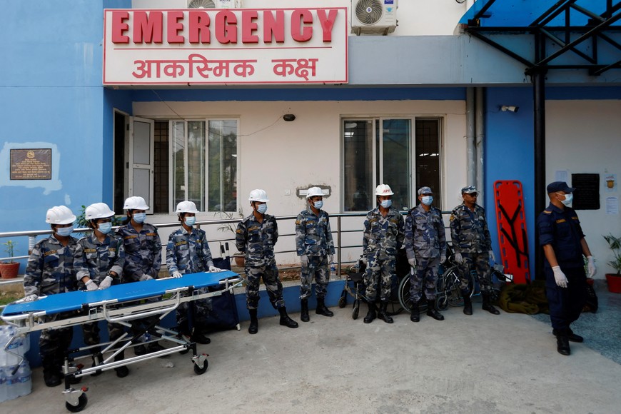 Members of Armed Police Force standby outside the hospital as they wait for the victims of earthquake in Nepalgunj, Nepal November 4, 2023. REUTERS/Navesh Chitrakar