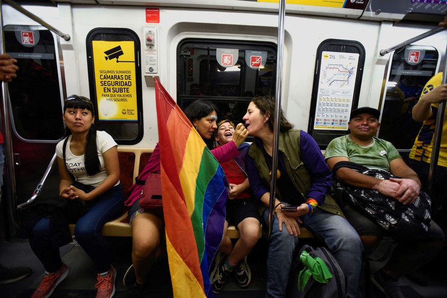 People travel on the subway as they prepare to participate in the LGBTQ Pride Parade in Buenos Aires, Argentina, November 4, 2023. REUTERS/Martin Cossarini