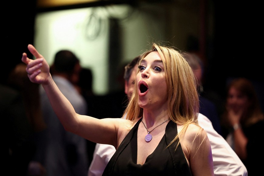 Milei's girlfriend Fatima Florezi reacts to the results of Argentina's runoff presidential election, in Buenos Aires, Argentina November 19, 2023. REUTERS/Agustin Marcarian