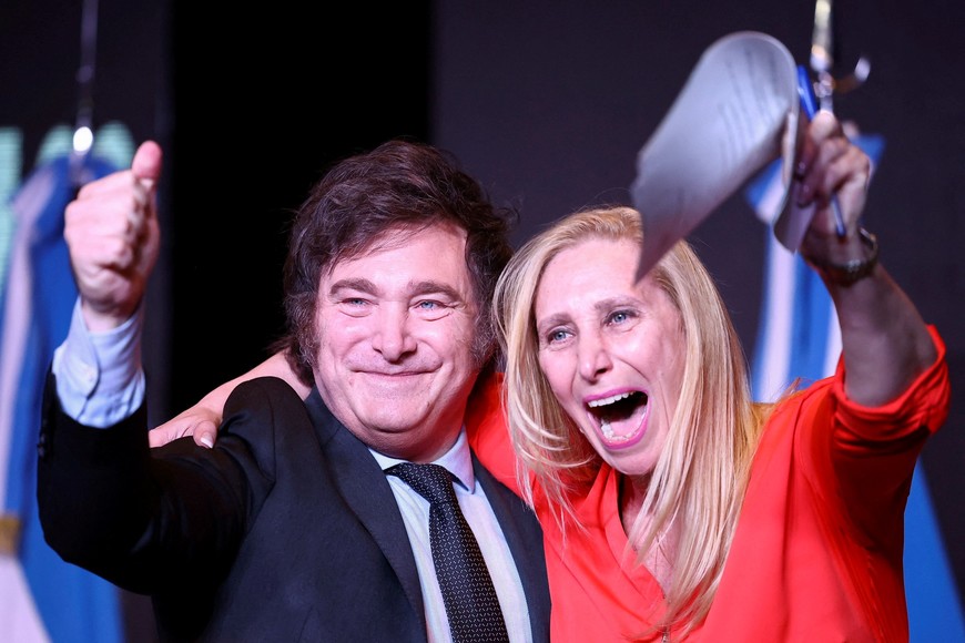 Argentine president-elect Javier Milei and his sister Karina Milei react to the results of Argentina's runoff presidential election, in Buenos Aires, Argentina November 19, 2023. REUTERS/Agustin Marcarian