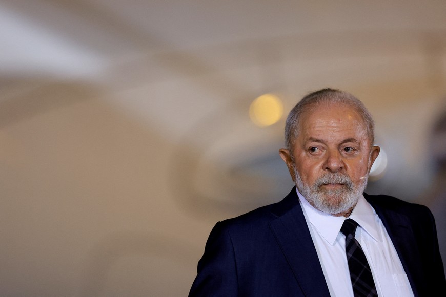 FILE PHOTO: Brazil's President Luiz Inacio Lula da Silva reacts after meeting with Brazilian citizens, who were repatriated from the Gaza Strip, upon arrival at the Air Force base of Brasilia, Brazil November 13, 2023. REUTERS/Ueslei Marcelino/File Photo