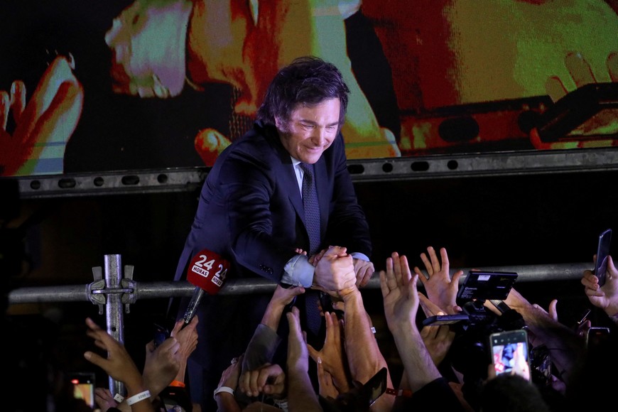 Argentine president-elect Javier Milei greets supporters after winning Argentina's runoff presidential election, in Buenos Aires, Argentina November 19, 2023. REUTERS/Cristina Sille
