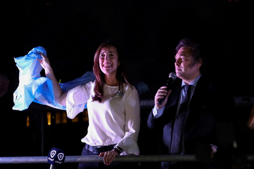 Argentine President-elect Javier Milei and Vice President-elect Victoria Villarruel greet supporters after winning Argentina's runoff presidential election, in Buenos Aires, Argentina November 19, 2023. REUTERS/Cristina Sille