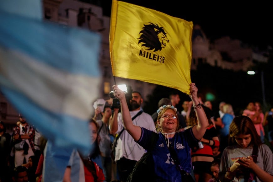 Argentine president-elect Javier Milei's supporters celebrate after Milei wins the runoff presidential election, in Buenos Aires, Argentina November 19, 2023. REUTERS/Adriano Machado