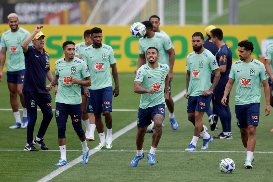 Soccer Football - World Cup - South American Qualifiers - Brazil Training - Granja Comary, Teresopolis, Brazil - November 19, 2023
Brazil's Marquinhos, Gabriel Jesus and Raphinha during training REUTERS/Ricardo Moraes