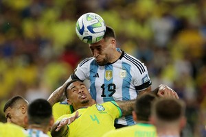 Soccer Football - World Cup - South American Qualifiers - Brazil v Argentina - Estadio Maracana, Rio de Janeiro, Brazil - November 21, 2023
Argentina's Nicolas Otamendi scores their first goal REUTERS/Ricardo Moraes