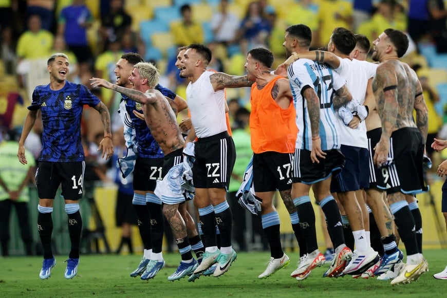 Soccer Football - World Cup - South American Qualifiers - Brazil v Argentina - Estadio Maracana, Rio de Janeiro, Brazil - November 21, 2023
Argentina's Lautaro Martinez and teammates celebrate after the match REUTERS/Sergio Moraes