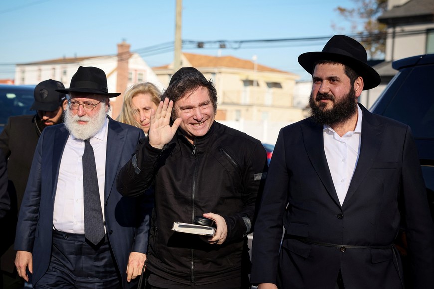 Argentine President-elect Javier Milei greets people on the day of his visit to the resting place of the Lubavitcher Rebbe, Rabbi Menachem M. Schneerson at the Old Montefiore Cemetery in the Queens borough of New York City, U.S., November 27, 2023.  REUTERS/Brendan McDermid