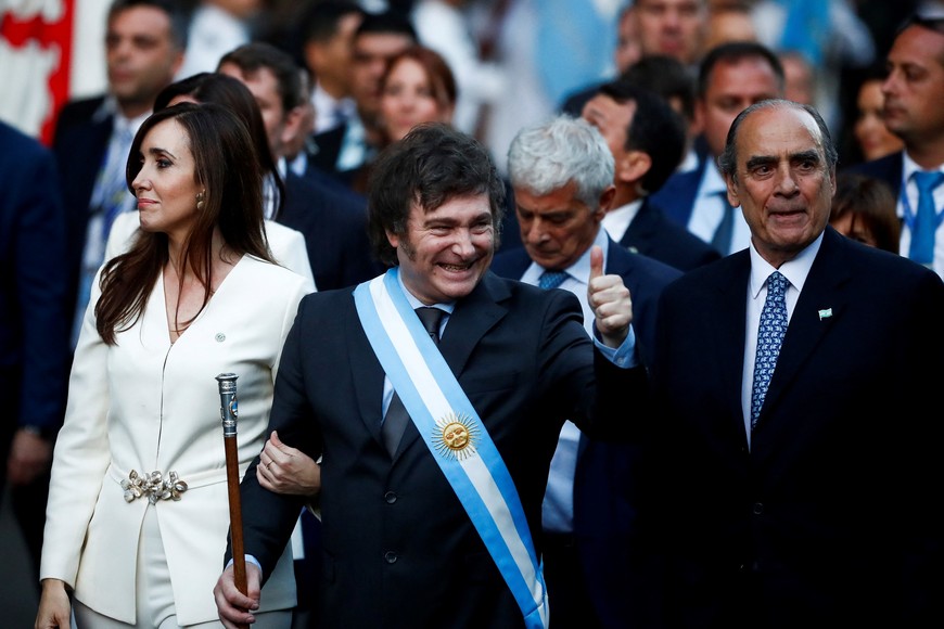 Argentina's President Javier Milei and Vice President Victoria Villarruel walk to the Metropolitan Cathedral to attend a Te Deum on the day of his inauguration, in Buenos Aires, Argentina December 10, 2023. REUTERS/Martin Cossarini