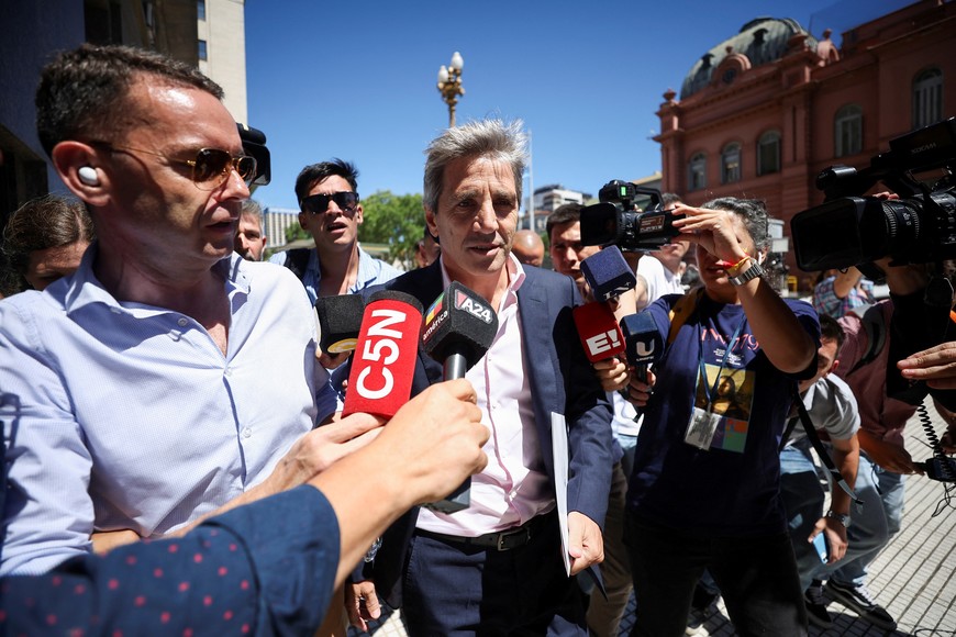 Argentina's Minister of Economy Luis Caputo speaks to the press, one day after the inauguration of Argentina's President Javier Milei, in Buenos Aires, Argentina, December 11, 2023. REUTERS/Agustin Marcarian