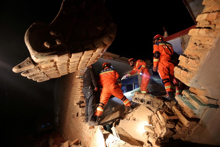 Rescue workers conduct search and rescue operations at Kangdiao village following the earthquake in Jishishan county, Gansu province, China December 19, 2023. China Daily via REUTERS ATTENTION EDITORS - THIS PICTURE WAS PROVIDED BY A THIRD PARTY. CHINA OUT. NO COMMERCIAL OR EDITORIAL SALES IN CHINA.