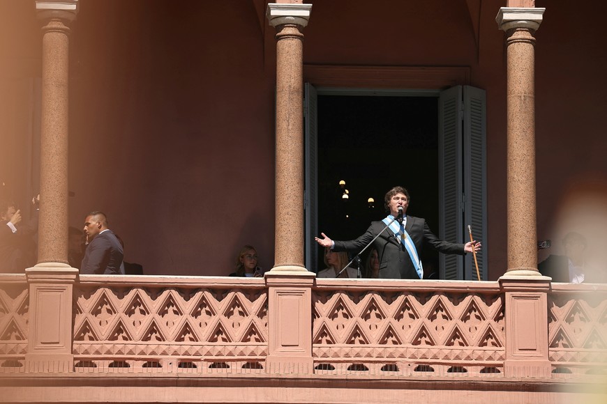 Argentina's President Javier Milei addresses supporters from the Casa Rosada balcony, after his swearing-in ceremony, in Buenos Aires, Argentina December 10, 2023. REUTERS/Agustin Marcarian