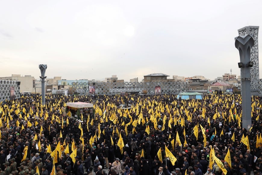 People gather for the funeral ceremony of senior adviser for Iran's Revolutionary Guards, Sayyed Razi Mousavi, who was killed in an Israeli air strike outside the Syrian capital Damascus, in Tehran, Iran, December 28, 2023. Majid Asgaripour/WANA (West Asia News Agency) via REUTERS ATTENTION EDITORS - THIS IMAGE HAS BEEN SUPPLIED BY A THIRD PARTY.   ATTENTION EDITORS - THIS PICTURE WAS PROVIDED BY A THIRD PARTY