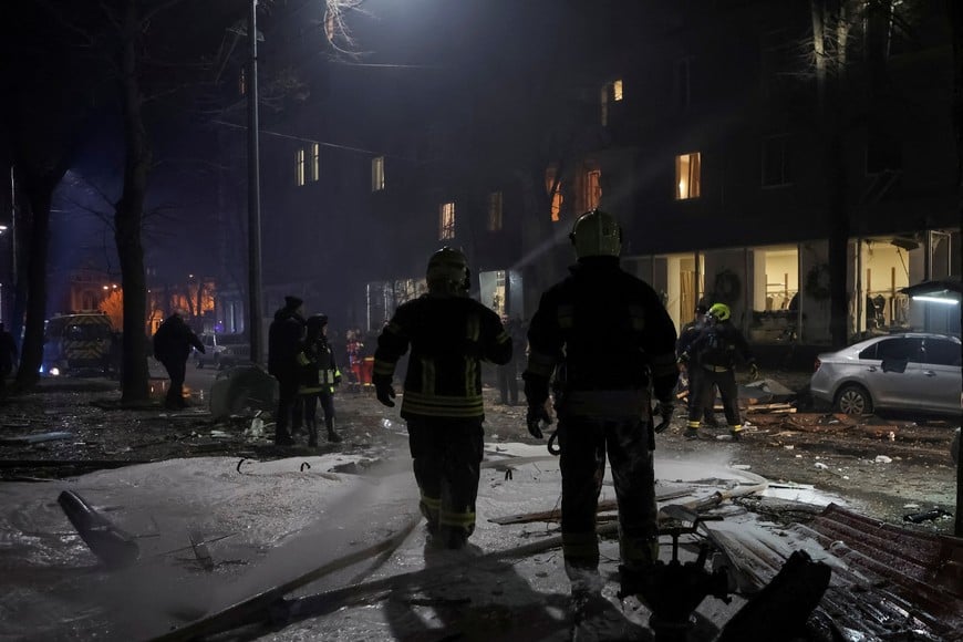 Rescuers work at the site of a Russian missile strike, amid Russia's attack on Ukraine, in central Kharkiv, Ukraine December 30, 2023. REUTERS/Sofiia Gatilova