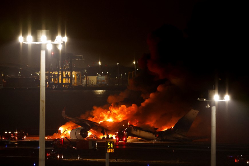 Japan Airlines' A350 airplane is on fire at Haneda international airport in Tokyo, Japan January 2, 2024. REUTERS/Issei Kato