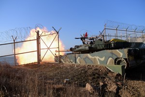 South Korean marine's K1E1 tank fires during a military drill on Yeonpyeong Island, South Korea, January 5, 2024.   The Defense Ministry/Handout via REUTERS   ATTENTION EDITORS - THIS IMAGE HAS BEEN SUPPLIED BY A THIRD PARTY.