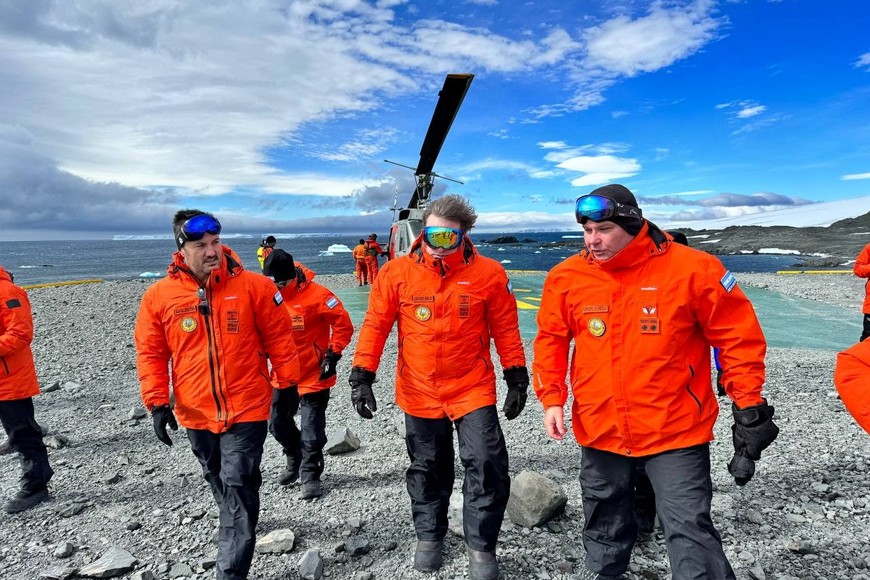 Argentina's President Javier Milei walks next to Defense Minister Luis Petri at the Base Esperanza, in Antarctica, January 6, 2024. Argentine Presidency/Handout via REUTERS ATTENTION EDITORS - THIS IMAGE WAS PROVIDED BY A THIRD PARTY. NO RESALES. NO ARCHIVES