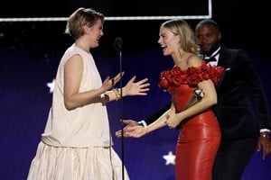 Greta Gerwig and Margot Robbie react as they receive the Best Comedy Award for 'Barbie,' during the 29th Annual Critics Choice Awards in Santa Monica, California, U.S., January 14, 2024. REUTERS/Mario Anzuoni